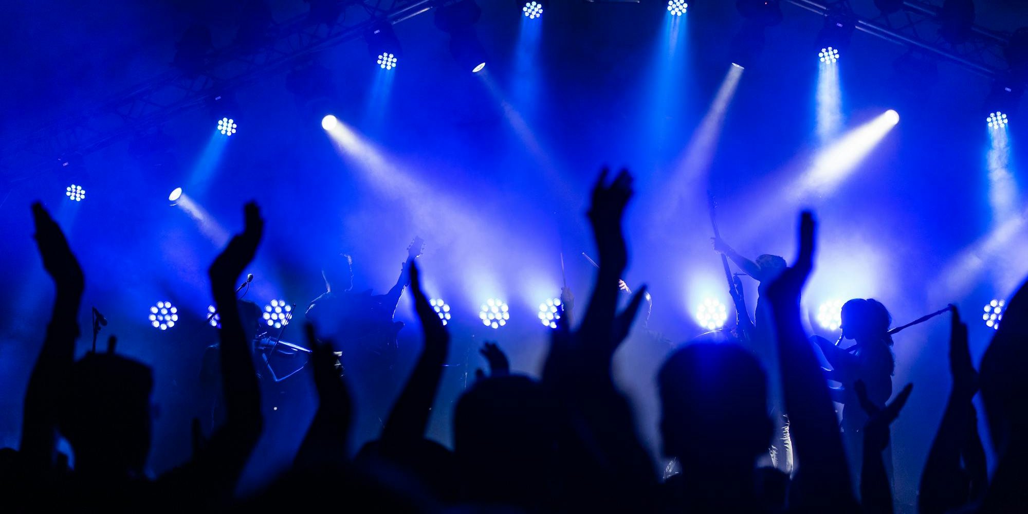 Outdoor concert stage with lights under the stars at an Italian summer music festival